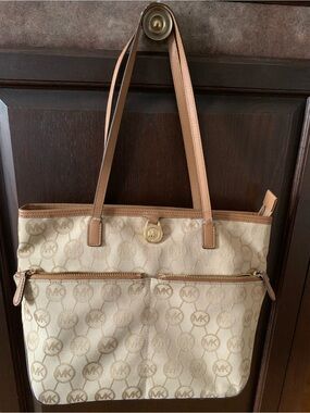 Michael Kors Cream and Tan Logo Tote with Front Zip Pockets and Leather Straps